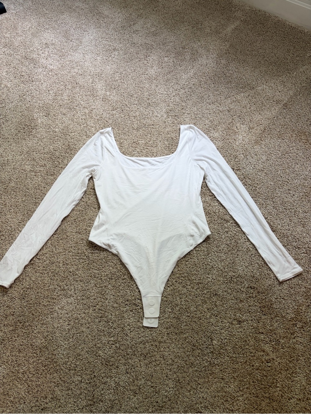 White Lululemon bodysuit